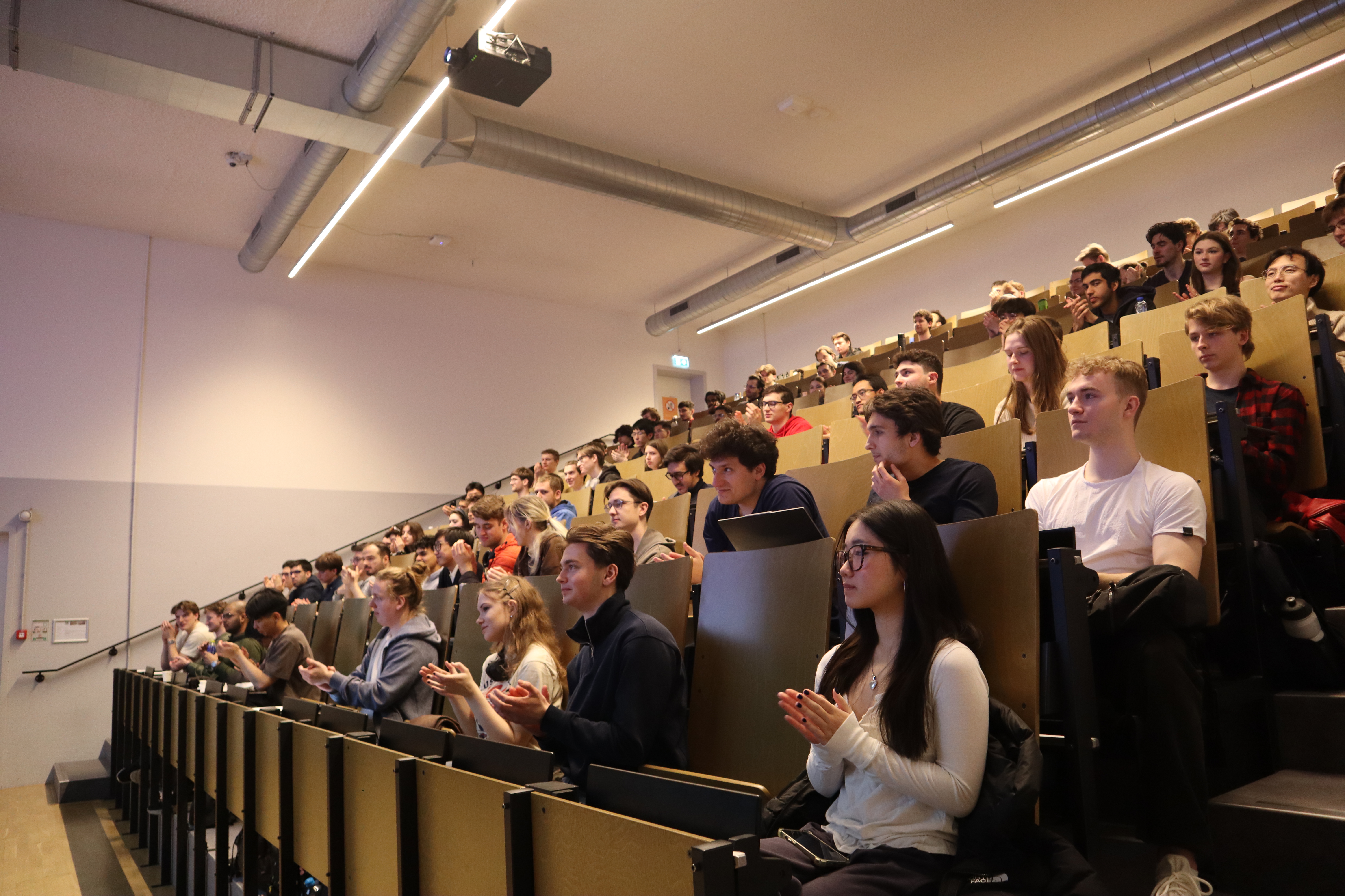 Students attending a Serpentine AI lunch lecture with Nebius